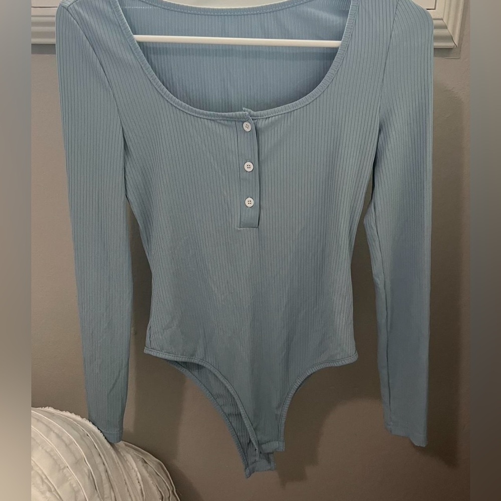 Light blue body suit